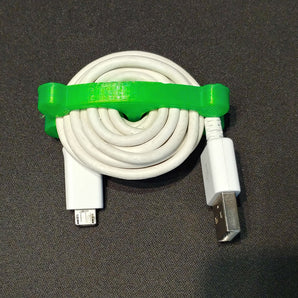 Συμπαγής κάτοχος και περιτύλιγμα καλωδίων USB