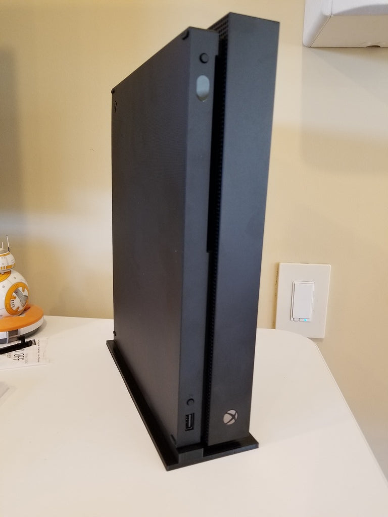 Xbox One X Κατά vertically