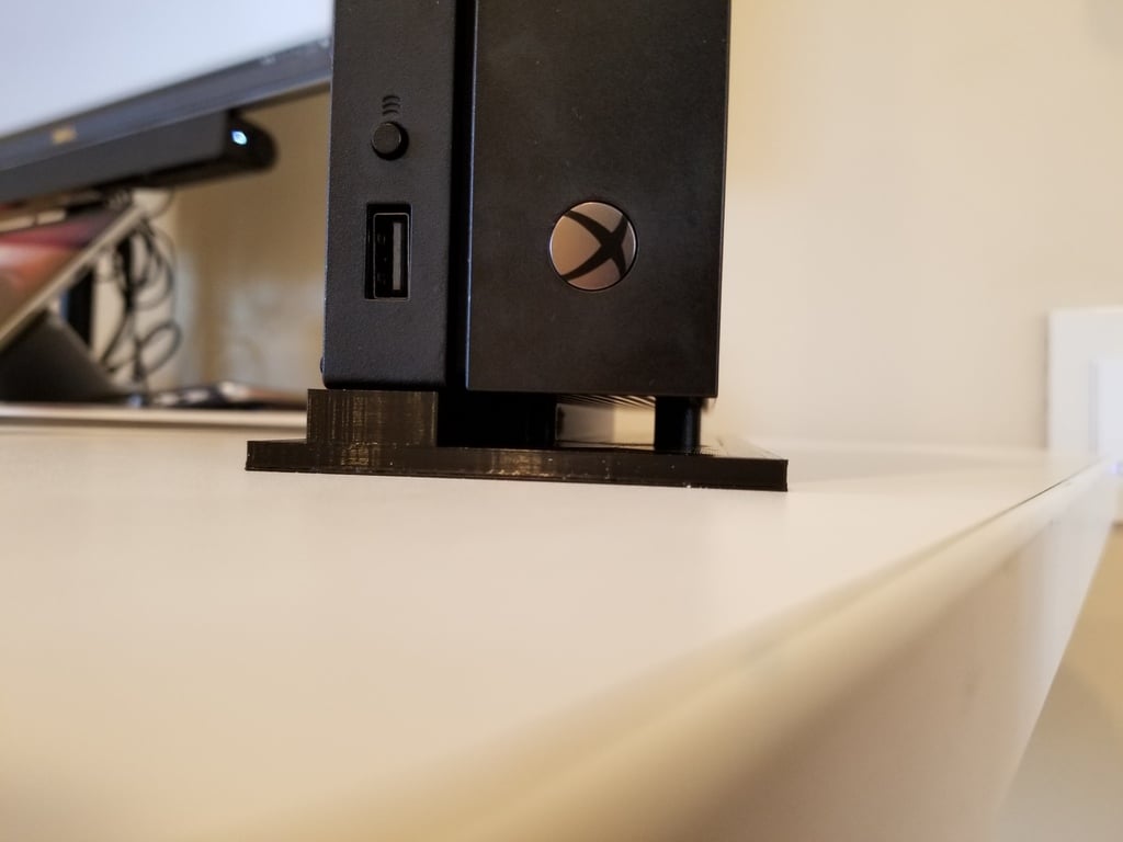 Xbox One X Κατά vertically