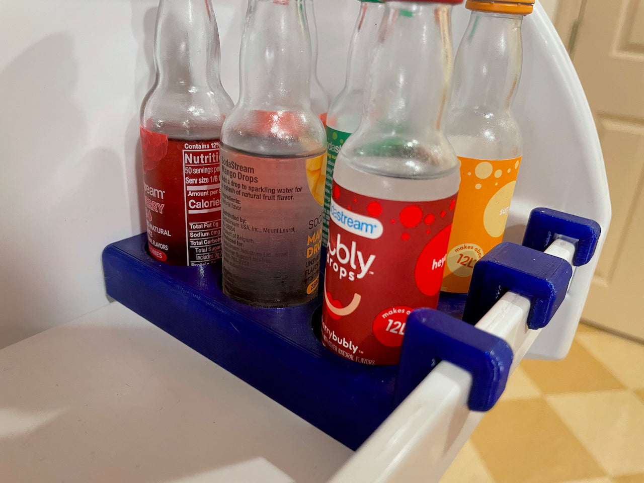 Θήκη μπουκαλιών γεύσης Sodastream για το ψυγείο